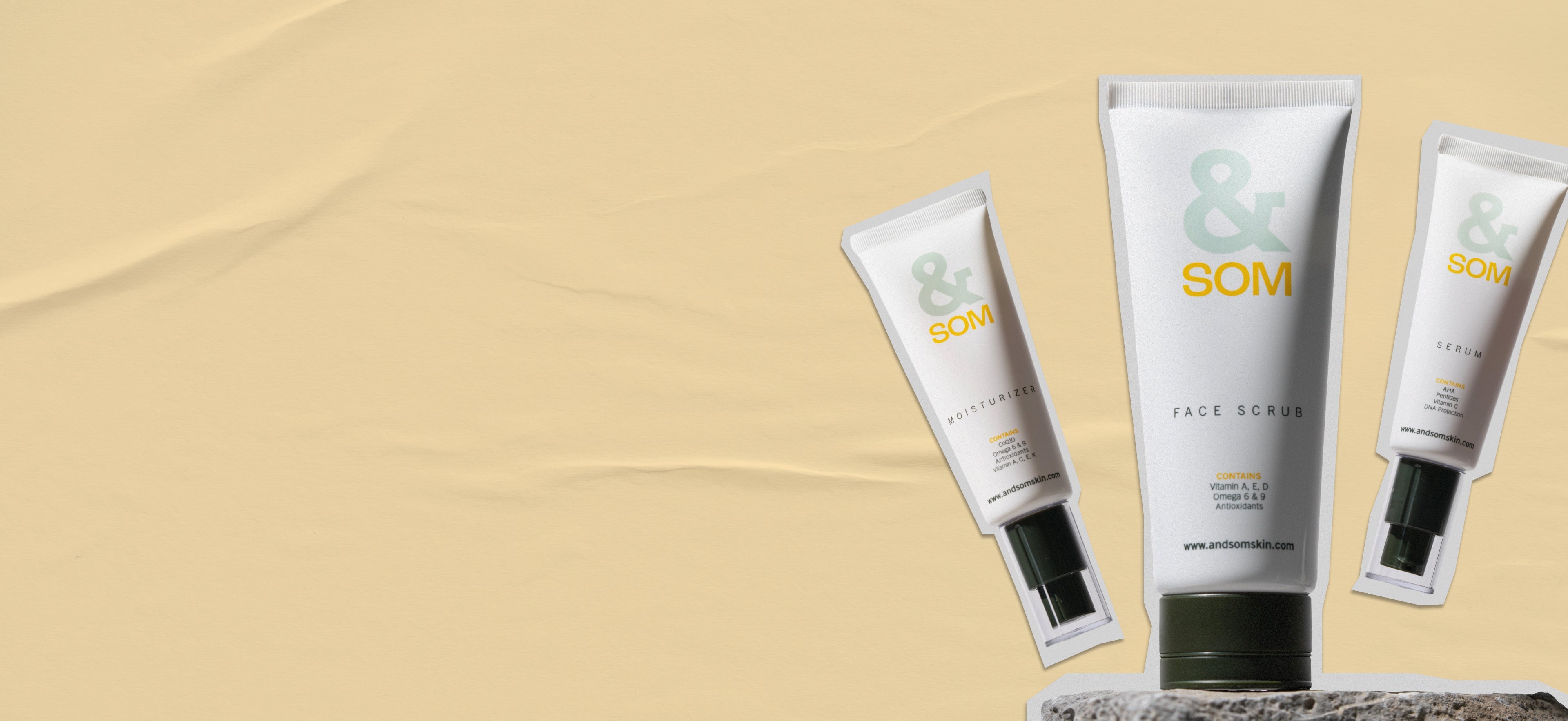 Three skincare products with 'SOM' branding on a beige background